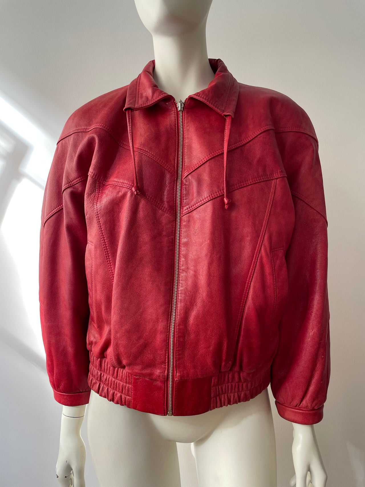 Vintage red leather bomber jacket