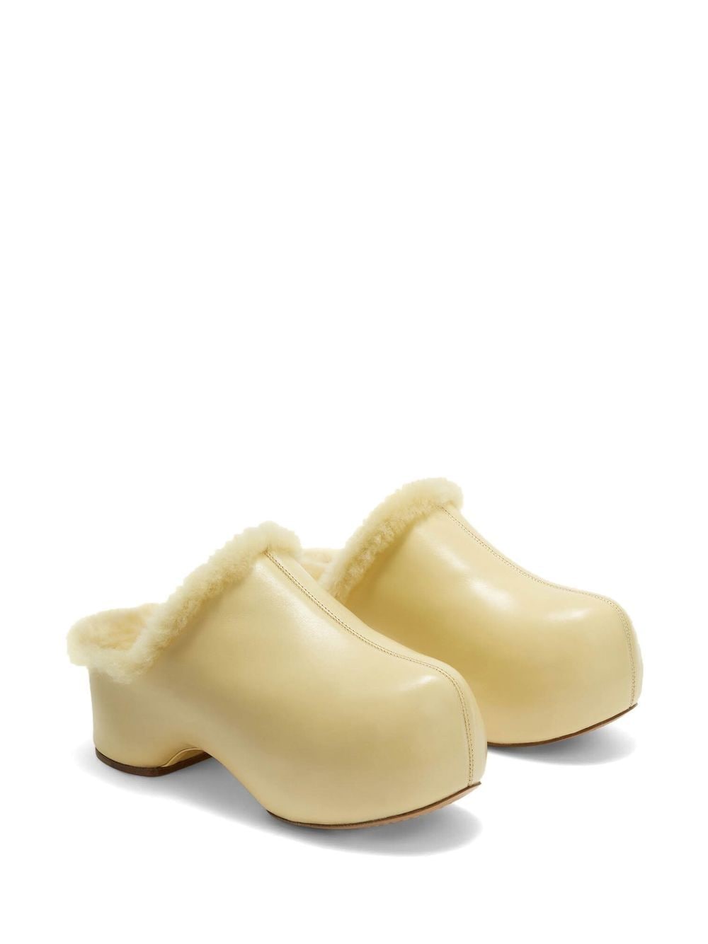 Jil Sander ‘Indulgence’ fur lined clogs in butter yellow 39