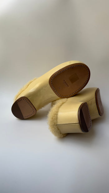 Jil Sander ‘Indulgence’ fur lined clogs in butter yellow 39