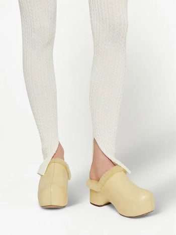 Jil Sander ‘Indulgence’ fur lined clogs in butter yellow 39