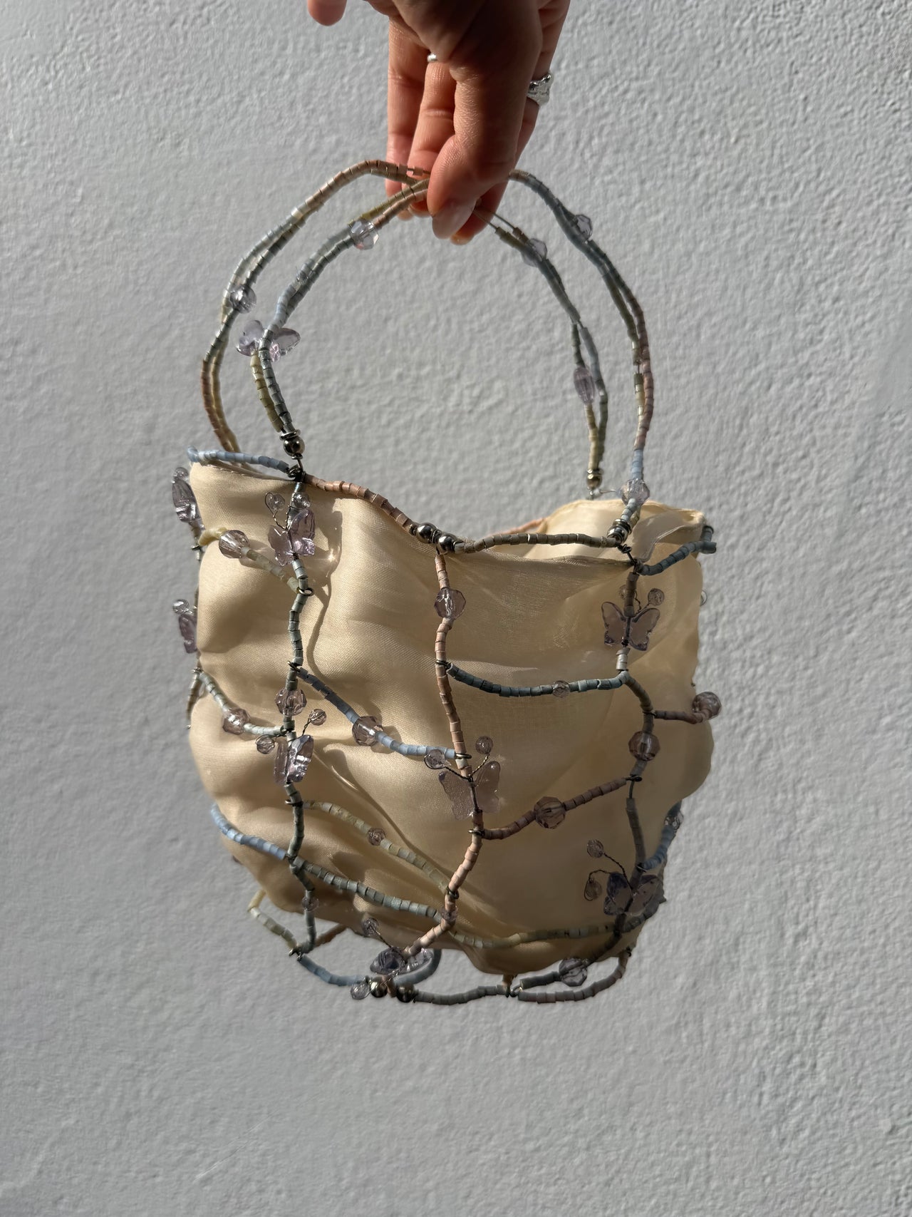 Bottega Veneta 1990’s silk bucket bag with butterfly wire frame