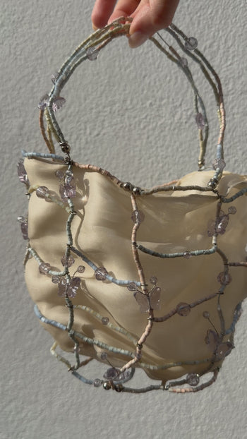 Bottega Veneta 1990’s silk bucket bag with butterfly wire frame